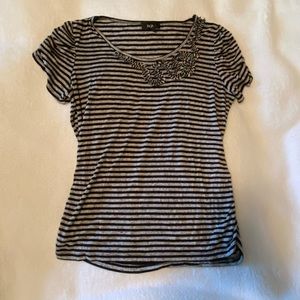 Black and white ruffled front t shirt.